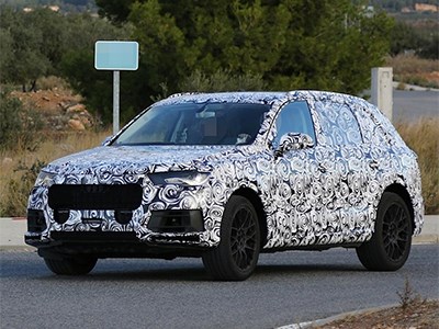 Audi Q7 2014 проглядывает сквозь камуфляж